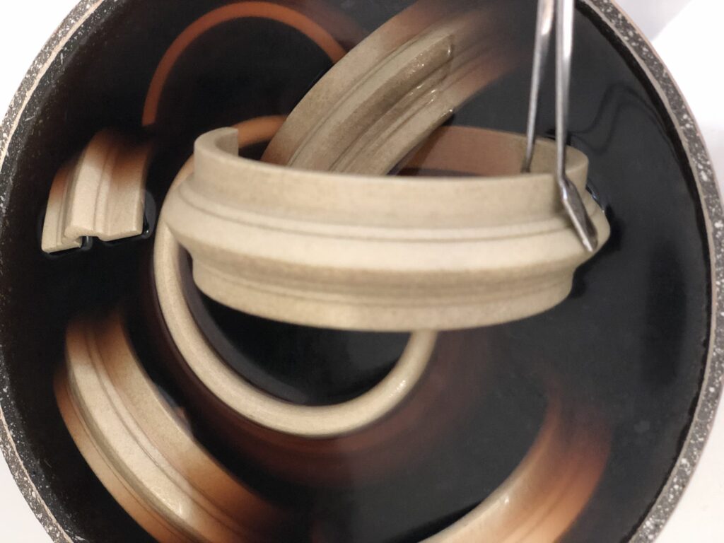 Hand-dyed finish in a warm botanical tone.